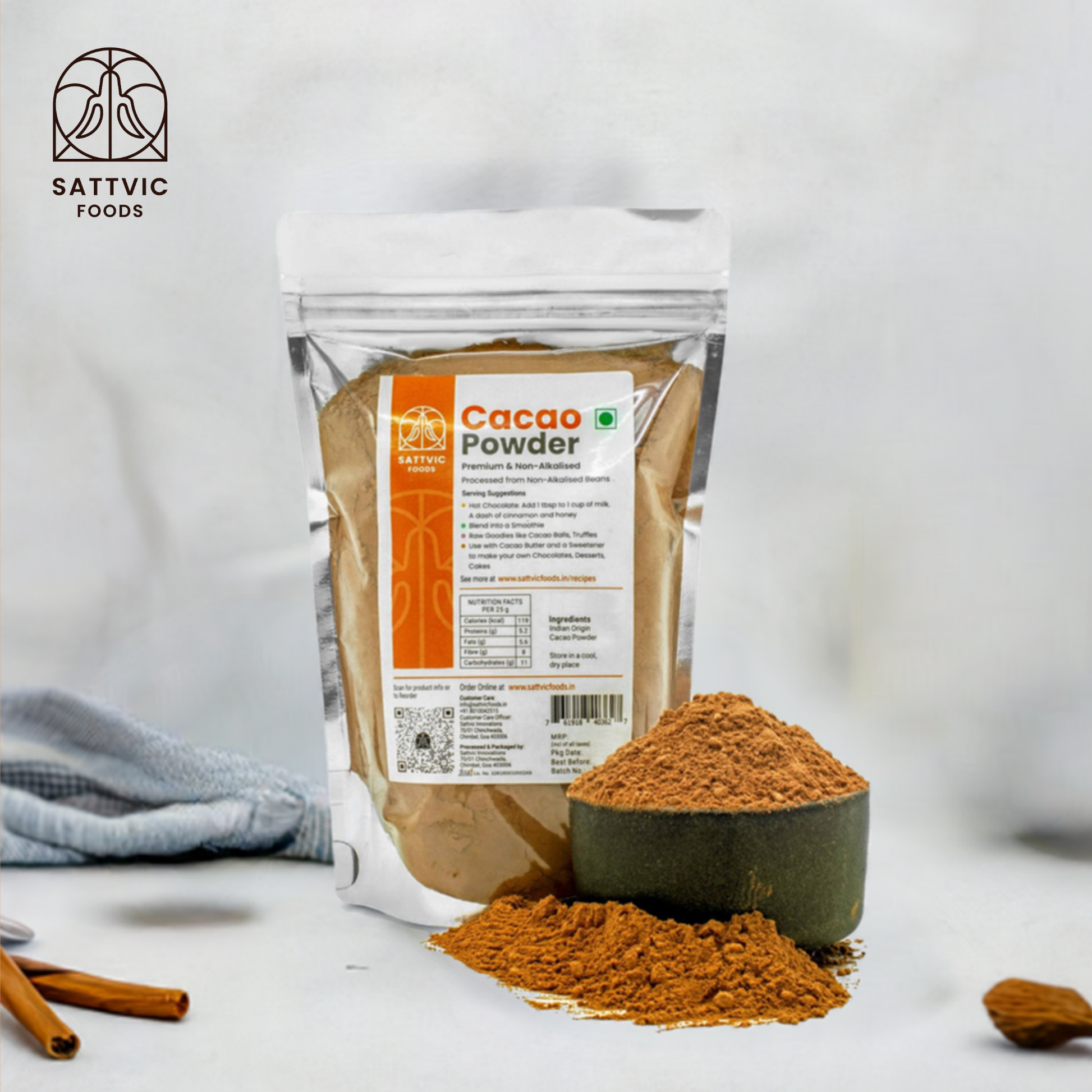 Sattvic foods raw cacao powder in a stand up pouch with a bowl of cacao powder beside it.